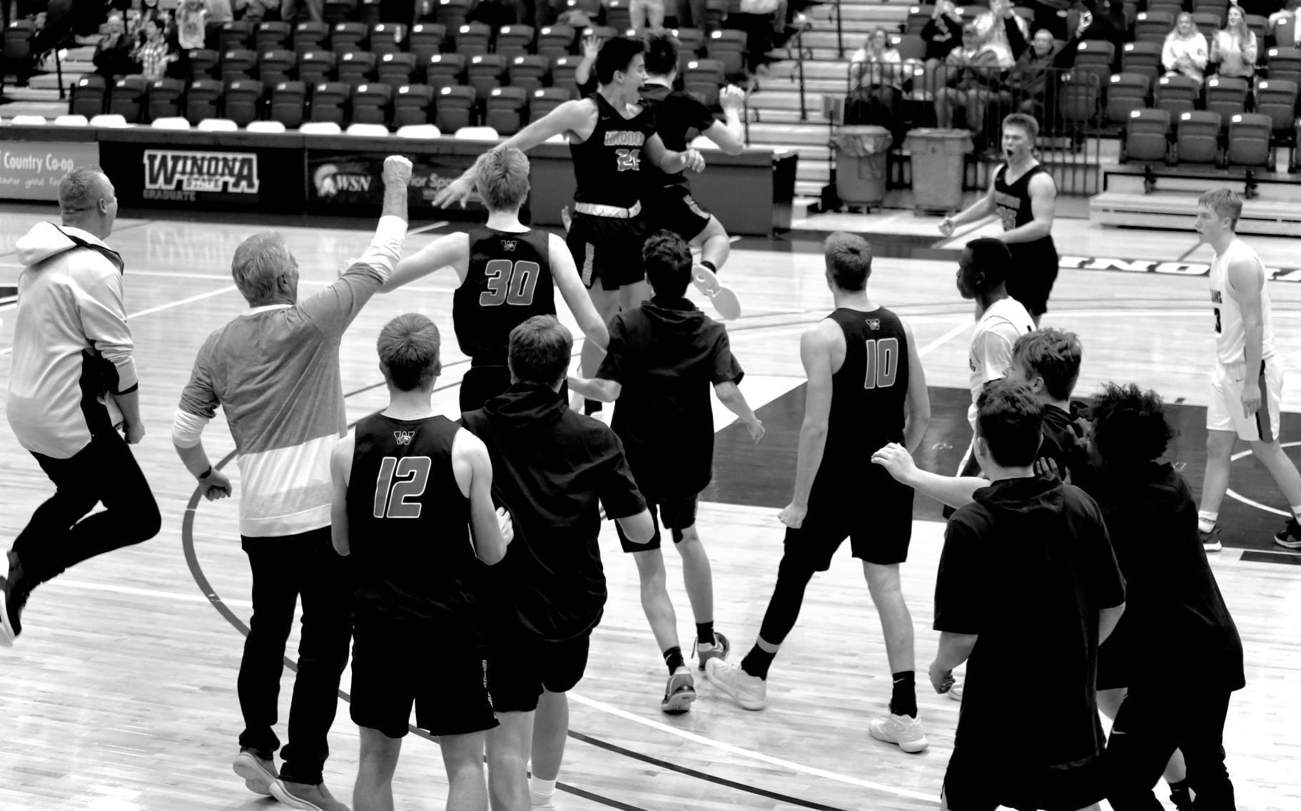 The Winhawks celebrate after a buzzer-beating shot #2